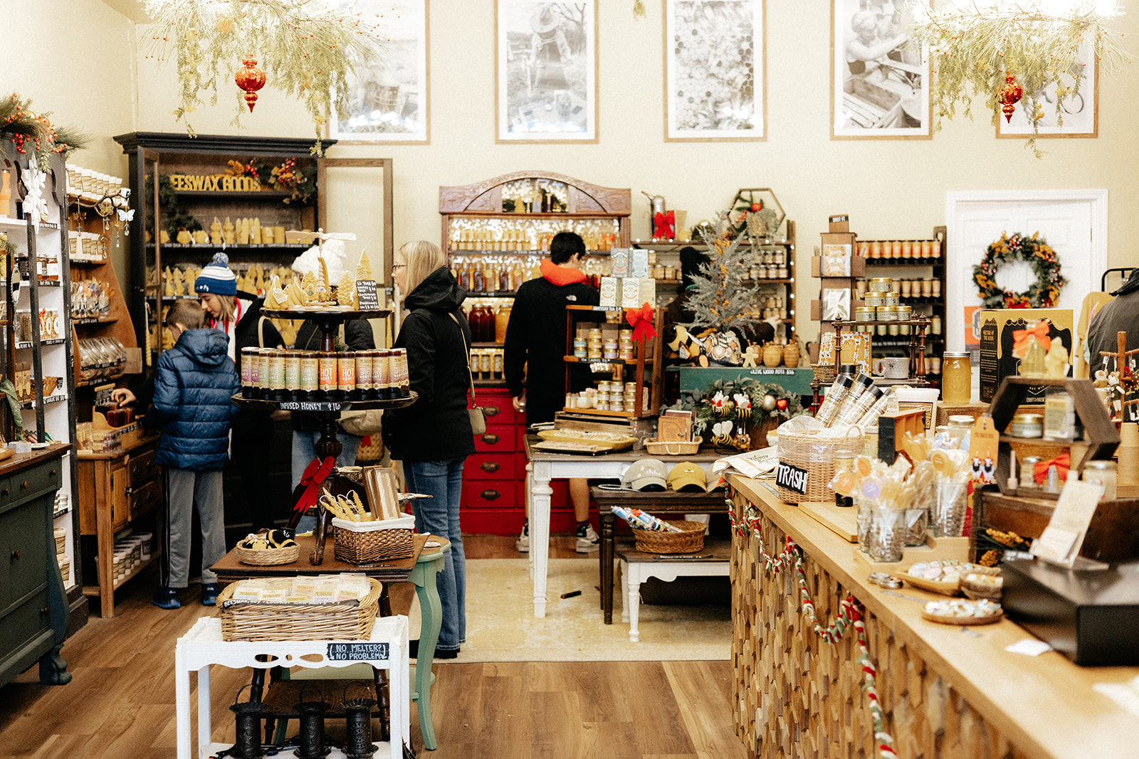 people shopping inside a store with holiday items
